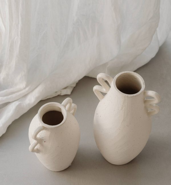 kaboompics_elegant-jewelry-and-decor-necklaces-bracelets-and-vases-free-stock-photo-collection-35780.jpg